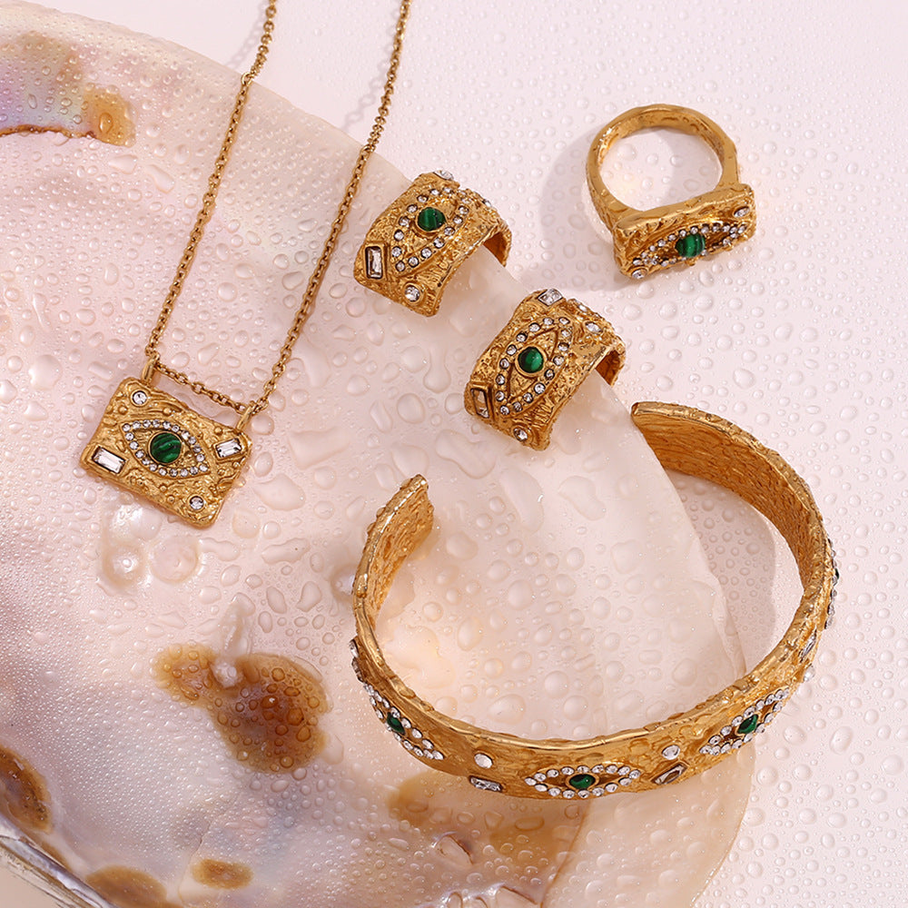 Fashionable luxury peacock stone eyes zircon pendant necklace titanium steel gold-plated jewelry set jewelry for women